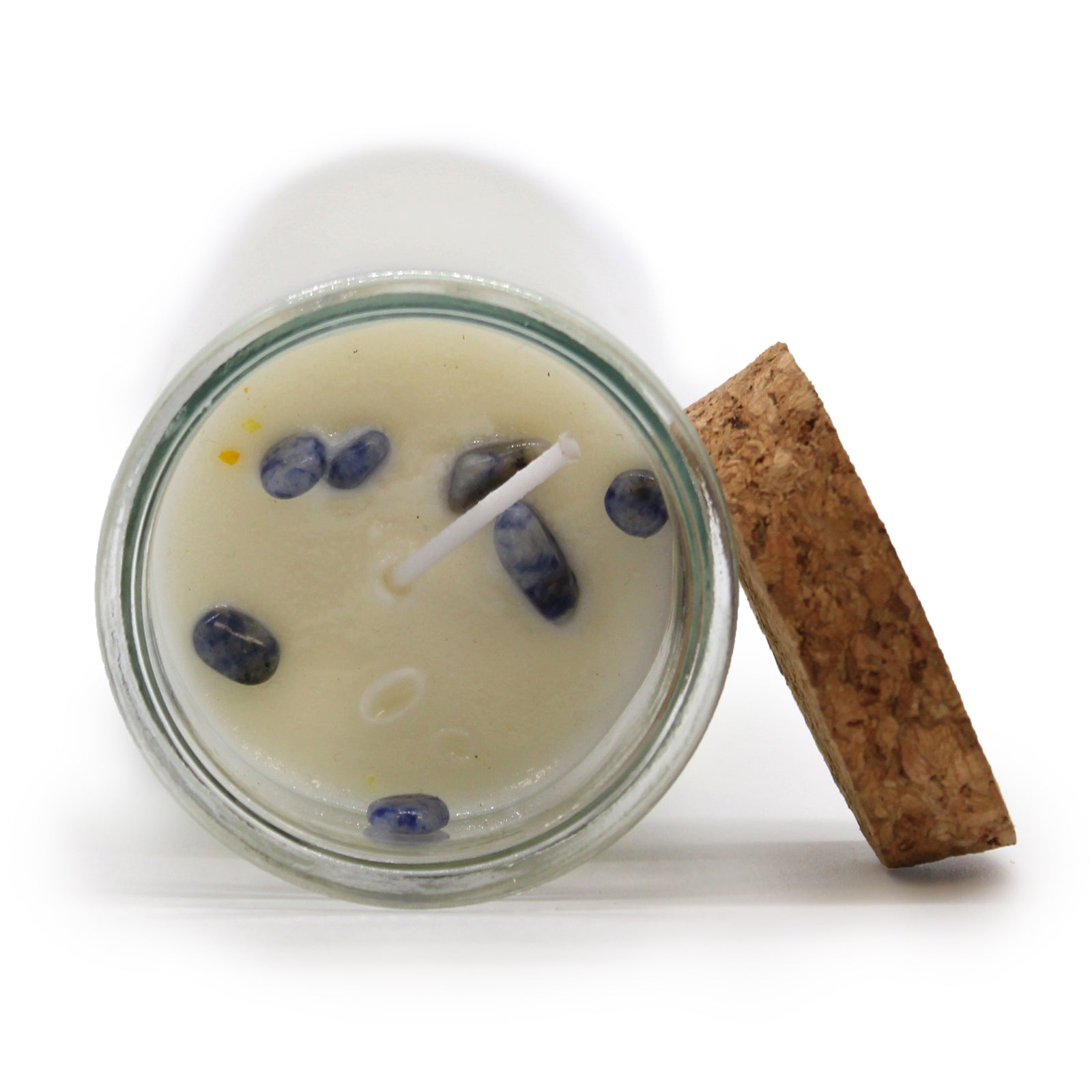 Harness the power of the Magic Spell Candle - Protection to form a divine shield that repels negativity and nurtures a serene, secure environment. This candle safeguards your energy and enhances spiritual harmony. Within its glow lies genuine Sodalite, the stone of peace and protection, sharpening intuition and clearing the mind. The enchanting Dragons Blood fragrance fills your space with grounding energy, banishing harmful influences. Crafted from soy wax, it burns cleanly and evenly, releasing its mystic