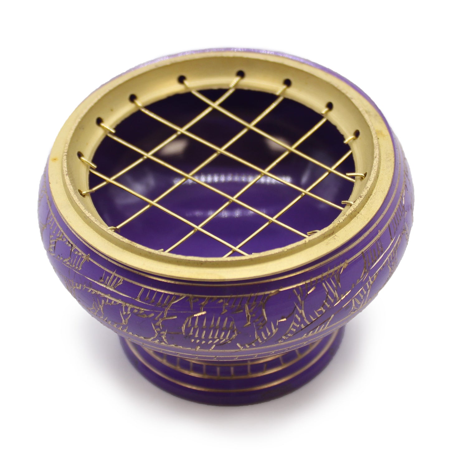 This Charcoal Incense Jar is a beautifully handcrafted piece from India, finished in deep purple and adorned with intricate golden patterns. Its slightly raised base and traditional design make it perfect for ritual use, purification ceremonies, or for working with the Crown chakra.