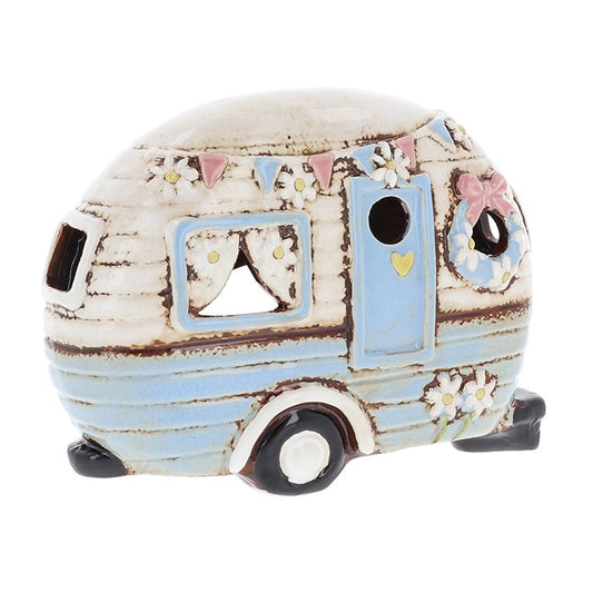 Pale blue ceramic caravan tealight holder. Handcrafted with vintage charm. Enchant your space with glow & nostalgia from thewitchesgarden.co.uk