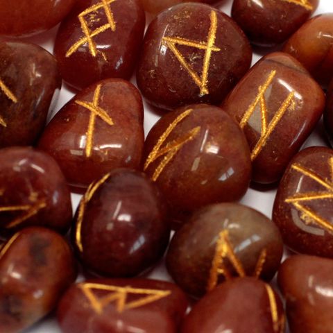 Unlock ancient symbols of divination with this hand-carved Red Aventurine Rune Stone Set.
This beautiful set contains 25 tumbled Red Aventurine crystals, each carefully engraved with a rune symbol—24 traditional runes and 1 blank stone for the unknowable.
Red Aventurine is a powerful stone of vitality, passion, and manifestation. It's known to:
Boost determination, confidence, and creativity
Encourage positive action and leadership
Support grounding while enhancing energy flow
Stimulate the root chakr