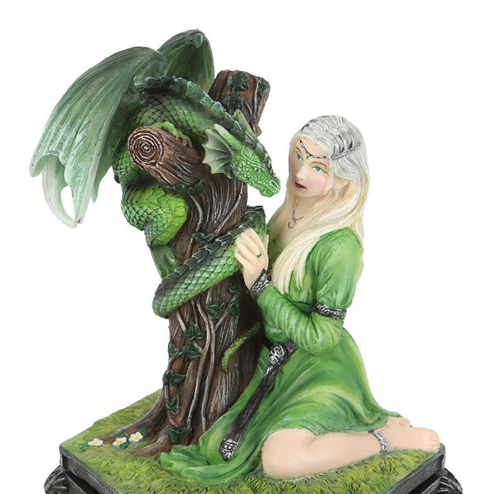 This exquisitely crafted resin box showcases a finely detailed figurine inspired by Anne Stokes' 'Kindred Spirits' dragon art, embodying the essence of summer. Ideal for safeguarding your cherished keepsakes, it merges enchanting design with everyday use. A magical treasure for any fantasy enthusiast, this officially licensed piece belongs to Anne Stokes' Dragon Friendship collection.