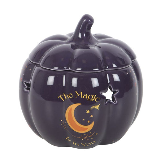 This midnight-blue ceramic oil burner shaped like a pumpkin is both functional and decorative, with golden stars and a crescent moon for added magic. A perfect gift for autumn lovers or anyone who enjoys creating a cosy ambience with seasonal scents. Recommended for use with fragrance oil diluted with water. Always remove the lid whilst in use.
