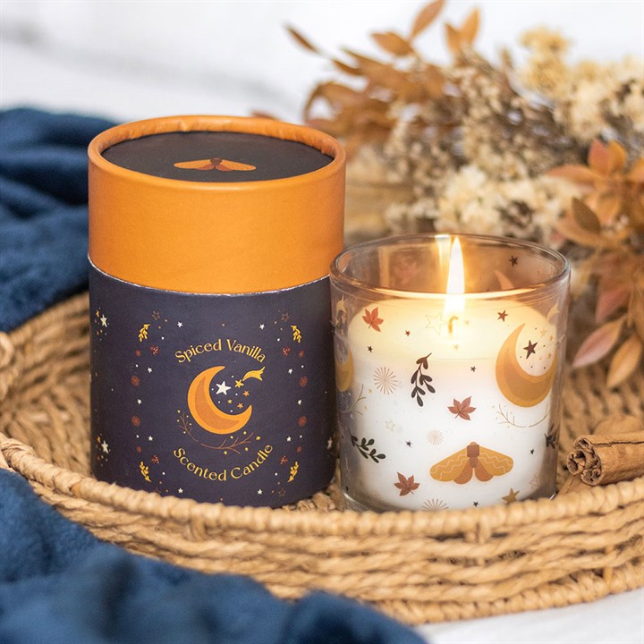 Embrace the enchanting spirit of the season with the Autumn Magic Spiced Vanilla Candle. Housed in a graceful glass jar adorned with an autumnal moon and delicate leaf motifs, this candle weaves a spell of warmth and comfort throughout your home. Its rich blend of spiced vanilla evokes cozy fireside moments and whispered secrets beneath harvest moons. With an approximate burn time of 28 hours, it invites you to create a sacred, inviting space where magic lingers in the air. Perfect as a thoughtful gift or a