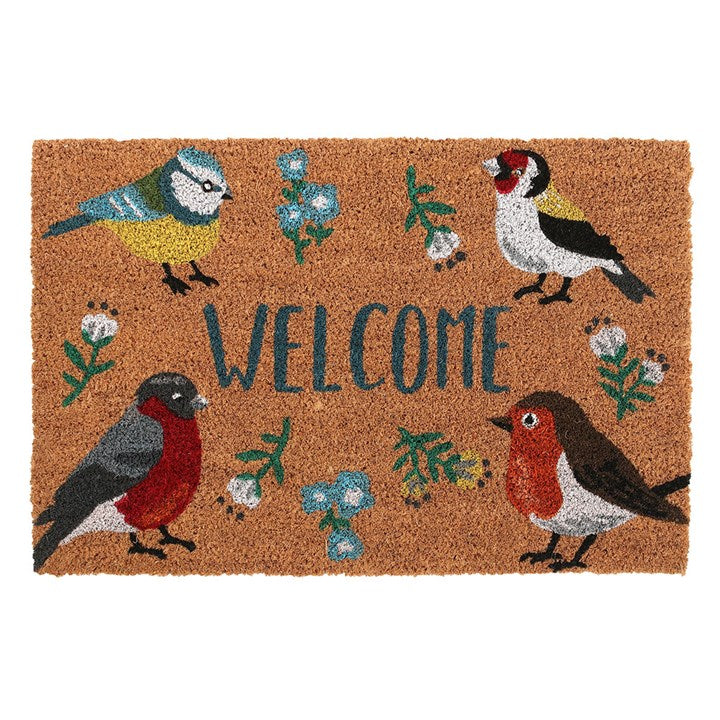 Invite visitors into your enchanted realm with this bewitching coir doormat. Adorned with the timeless word ‘Welcome’ and mystical depictions of beloved British garden birds—the Blue Tit, Robin, Goldfinch, and Bullfinch—this mat is ideal for sheltered doorways and secret garden paths. Beware, the magic of the printed design may wane under harsh weather’s spell.