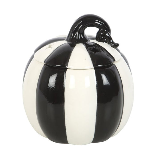Add some strange and unusual flair to your home with this black and white striped pumpkin oil burner. Perfect for your favourite fragrance oils, this statement piece creates a cosy atmosphere with a touch of the unexpected. Simply place a standard tealight in the back and add your favourite spooky scent to the bowl above. The removable lid completes the design, blending function and style seamlessly. Recommended for use with fragrance oil diluted with water. Always remove the lid whilst in use. Please pract