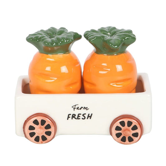This enchanting salt and pepper set features two charming carrot-shaped shakers nestled in a quaint little wagon. More than just a practical addition to your table, it brings a touch of magical whimsy to every meal. Perfect for those who cherish the spirit of the garden and delight in mystical charm. Remember, these treasures are handwash only and not meant for the microwave. Safe for your culinary spells and feasts.
