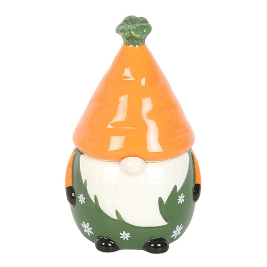 Bring a touch of whimsical magic to your sanctuary with this gonk-shaped oil burner, crowned by a carrot hat that lifts away to reveal a chamber for your fragrant oils. Light a tealight within to release enchanting aromas, perfect for celebrating the spirit of spring or honoring the devoted vegetable gardener. Remember to always lift the lid when in use, and enhance the experience by blending your fragrance oils with water for a gentle, mystical glow.