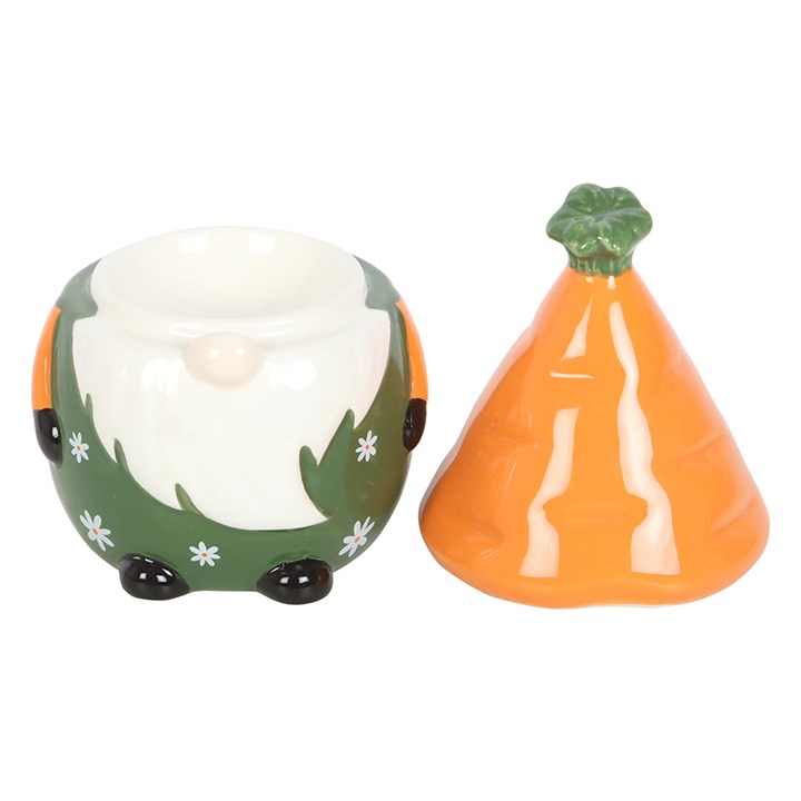 Gnome and carrot salt and pepper shakers on a white background