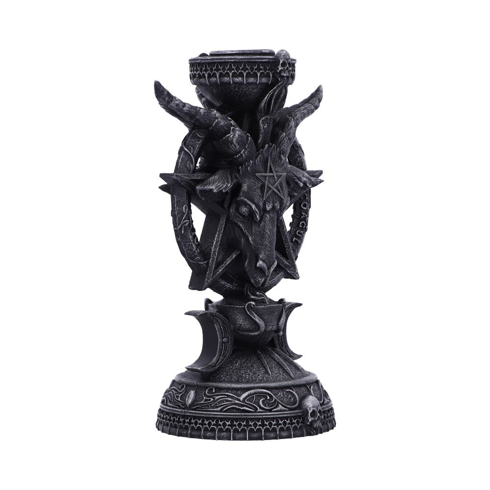 Decorative candle holder with intricate designs on a white background