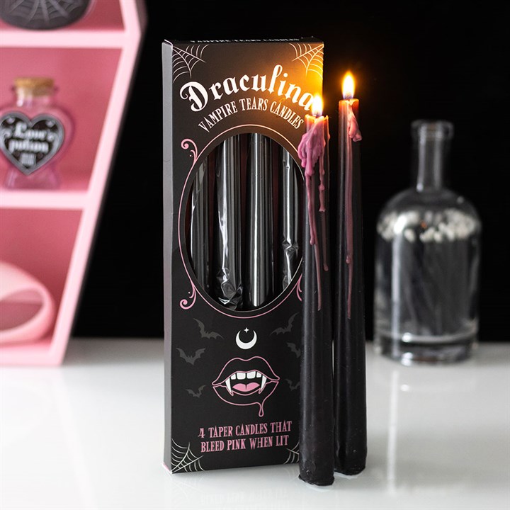 Illuminate your space with this enchanting set of four pink taper candles, each adorned with striking “vampire tears” that drip mystically as they burn. These unscented candles, with an approximate two-hour burn time each, are ideal for casting a gothic spell over your dinner gatherings or offering as a bewitching gift.