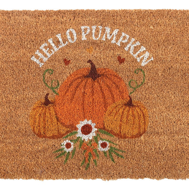 Embrace the enchanting spirit of autumn with this Natural Autumn Days Hello Pumpkin Doormat. Crafted from sturdy coir fibers, it welcomes guests with a warm "Hello Pumpkin" greeting framed by a mystical pumpkin design that captures the essence of the harvest season. Ideal for sheltered doorways or indoor use, this doormat invites cozy, magical vibes into your home while protecting your floors from the chill outside. Please note, the design may gently fade under extreme weather, preserving its charm for many