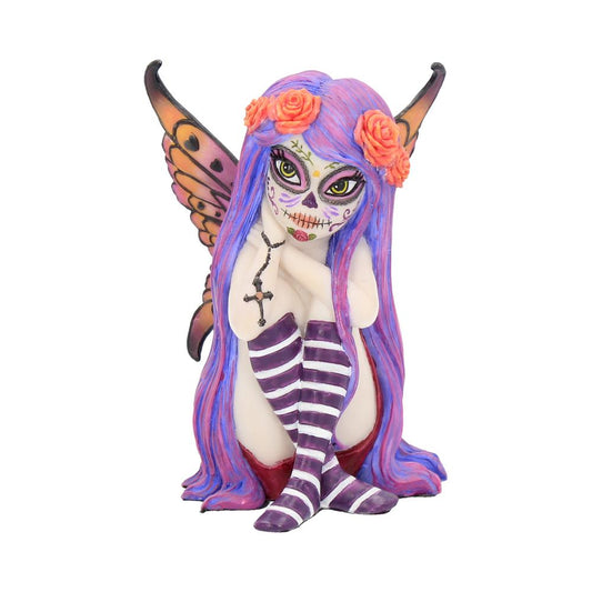 This striking, naughty little Sugar Skull fairy is called Esmerelda. She innocently sits, her striped legs crossed and raised up close to her chest. Her right hand touches the side of her face as the cross from her rosary beads hangs down her forearm. Bright orange roses contrast with her deep purple hair and which frames her lovely little sugar skull decorated face and her beautiful orange wings.