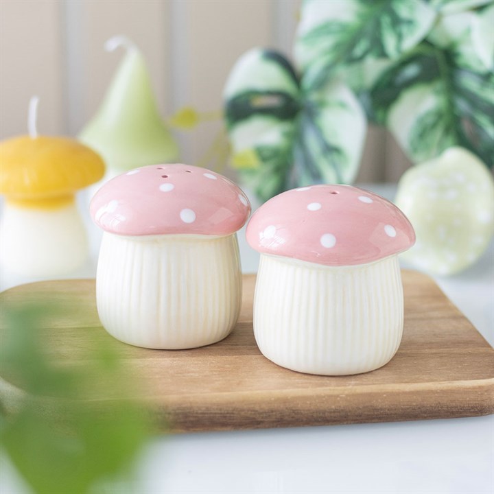 Add an enchanting touch to your meals with these charming pink mushroom salt and pepper shakers. Crafted from ceramic, this delightful duo brings whimsy and magic to any kitchen, making them an ideal gift for those who adore the mystical and the cute. Best cared for by hand washing.