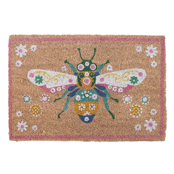 Welcome guests with a cheerful pop of colour using this floral bug doormat. Featuring a detailed bee design surrounded by blooming flowers, this durable coir mat is sure to add personality to your doorstep while keeping dirt at bay. Design may fade in extreme weather. Suggested for sheltered and indoor use only.