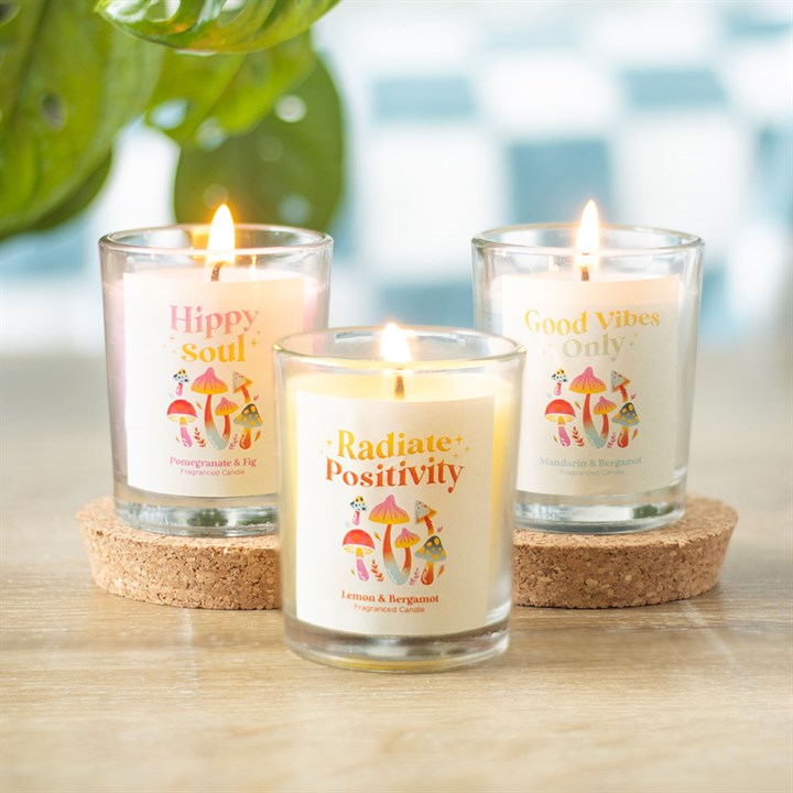 Infuse your space with enchanting aromas and uplifting energy using this trio of glass votive candles. Each one carries a unique scent spell: Hippy Soul blends Pomegranate and Fig, Radiate Positivity shines with Lemon and Bergamot, and Good Vibes Only radiates Mandarin and Bergamot. With an average burn time of 8 hours each, these candles invite a mystical ambiance that refreshes and inspires your sacred sanctuary.