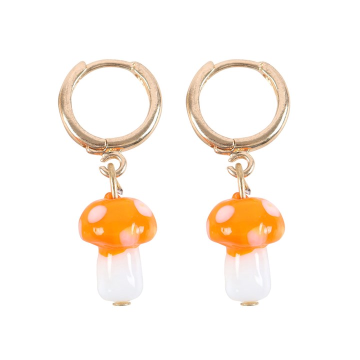 Add a touch of colour and joy to your jewellery collection with these orange toadstool mushroom dangle earrings. These delightful earrings feature intricately designed glass mushrooms that hang gracefully from a pair of small gold hoops, and comes with a matching informational tag.