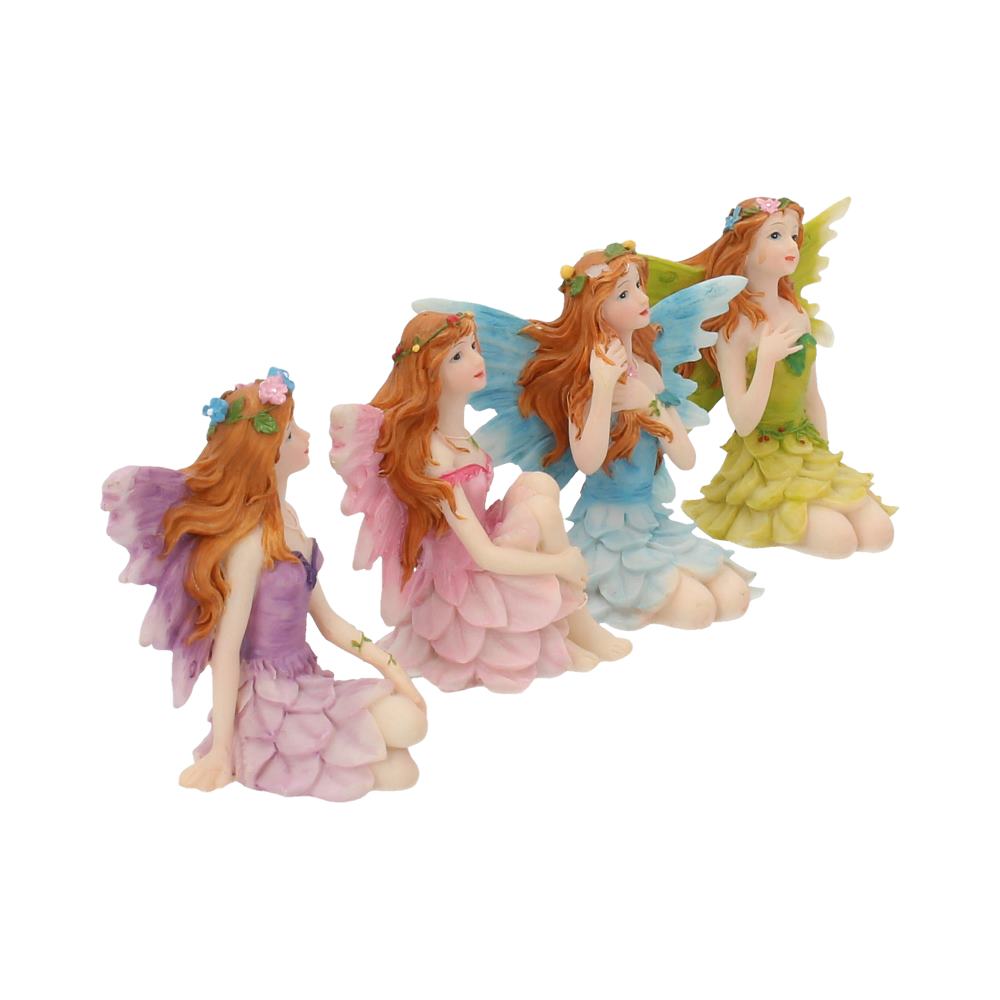 Four fairy figurines with different coloured wings