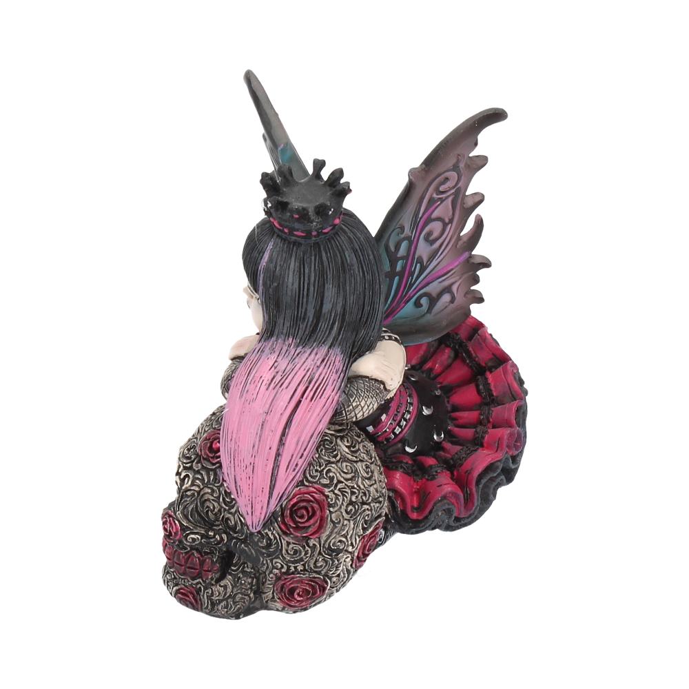 Fantasy figurine with black hair, pink accents, and intricate designs on a white background