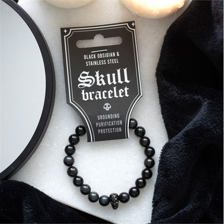 Experience the unique combination of mystique and style with this Black Obsidian Bead Bracelet, featuring an eye-catching black stainless steel skull charm. Designed with an elasticated band, this bracelet ensures a comfortable and flexible fit for any wrist.