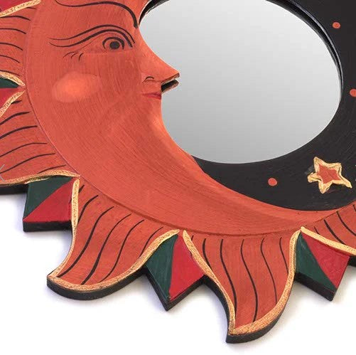 These beautiful hand carved mirrors depict the sun and moon with splendid gold detailing. Each mirror has a metal hoop on the reverse for ease of hanging. These mirrors boast intricate craftsmanship, with intricate gold designs adding a touch of luxury to any space. Hang them up with ease thanks to the handy metal hoop on the reverse.