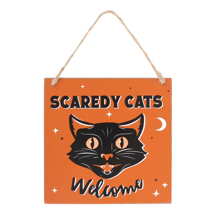 Hanging sign with a black cat illustration and 'SCAREDY CATS Welcome' text on an orange background.