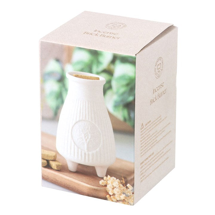 This cream ribbed ceramic Palo Santo Brick burner is perfect for safely holding and burning Palo Santo incense bricks. Its ribbed texture adds a contemporary yet timeless touch to any space. Cleansing and purifying negative energies, this burner can be used to enhance spiritual rituals or used as a decorative accent.