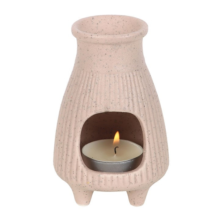 This greige ribbed ceramic Palo Santo Brick burner is perfect for safely holding and burning Palo Santo incense bricks. Its ribbed texture adds a contemporary yet timeless touch to any space. Cleansing and purifying negative energies, this burner can be used to enhance spiritual rituals or used as a decorative accent.