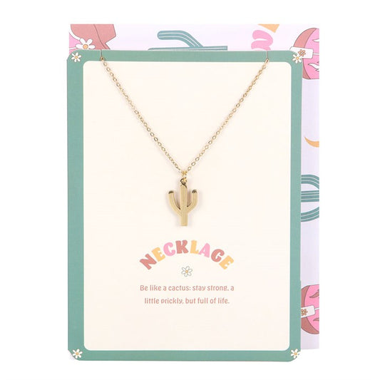 Gold cactus necklace on a decorative card with text