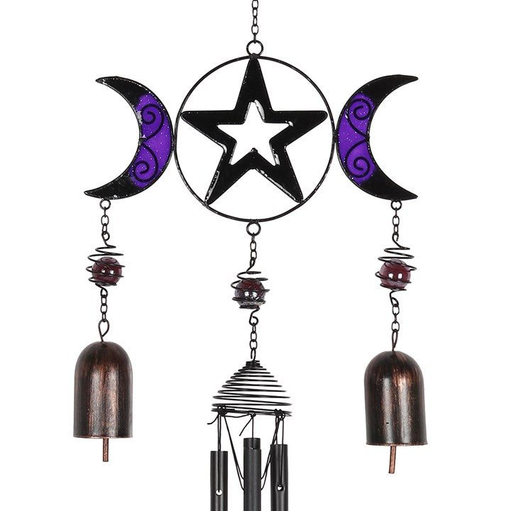 Embrace the enchanting energy of the Triple Moon with this exquisite windchime crafted from glass, metal, and resin. Its mystical black and purple design captures the sacred phases of the moon, symbolizing the Maiden, Mother, and Crone. Hang it in a sunny spot where gentle breezes can awaken its delicate bells, filling your space with soothing, magical sounds. As sunlight filters through the glass, it casts shimmering reflections that invite tranquility and spiritual connection. Measuring 72cm tall, this wi