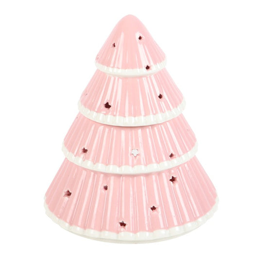 From The Witches’ Garden comes a contemporary spell for your seasonal home — the Pink Christmas Tree Oil Burner and Wax Warmer. This elegant ceramic design combines soft pink tones with delicate star-shaped cut-outs, casting a warm, enchanting glow across your space as the light of a single tealight flickers within.
Add a few drops of your favourite festive fragrance oil (diluted with water) or a wax melt to the dish above and watch as this modern Christmas tree fills your home with the comforting scents o