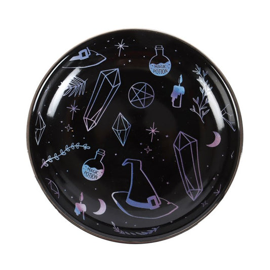 Store your jewellery and precious keepsakes in this enchanting Crystal Witch Trinket Dish. Featuring iridescent illustrations that shimmer against a deep black background, this dish captures the mystical essence of witchcraft and magic. Perfect for adding a touch of otherworldly charm to your altar, dresser, or bedside table, it keeps your treasured items safe while enhancing your sacred space with its spellbinding design. Embrace the magic in everyday moments with this captivating accessory that blends bea