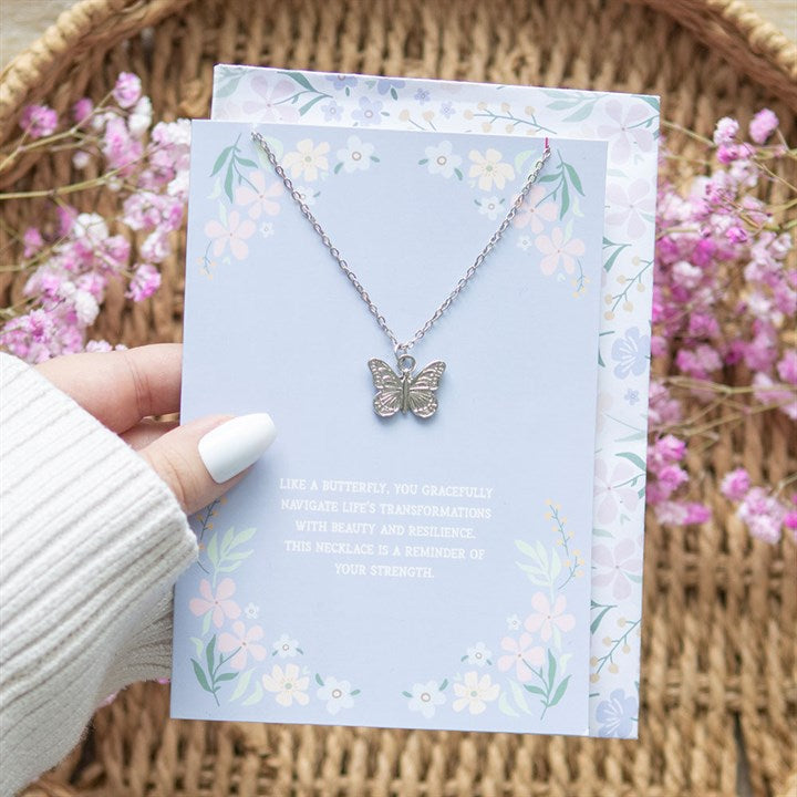 This sweet, silver-toned butterfly necklace comes nestled on a matching greeting card, making it the perfect gift to show love, support and positivity.