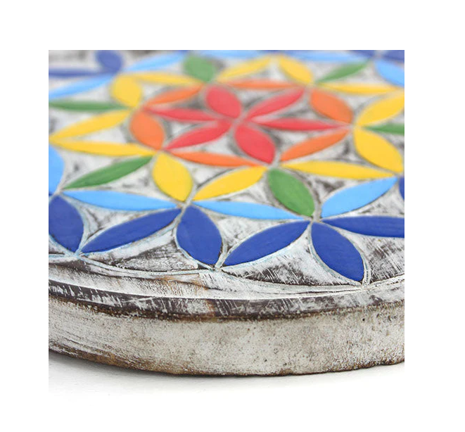 Intricate Flower of Life plaque from Bali. Sacred geometry wall art with natural wood aroma. Perfect for altars, meditation rooms & spiritual décor.