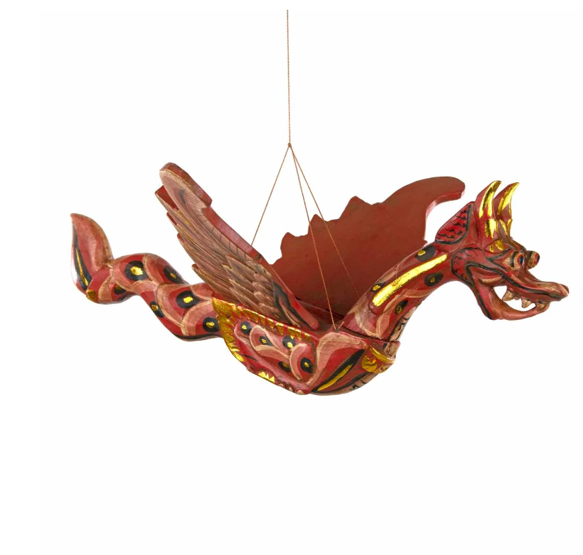 Summon fierce protection and ancient wisdom with this Flying Dragon Spirit Guardian Mobile, a powerful symbol of courage, strength, and spiritual guardianship. Handcrafted in Bali and painted in vibrant colours with shimmering gold accents, this dragon is more than décor—it is a sacred protector.