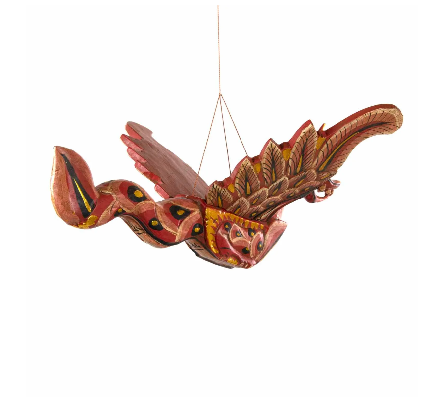 Summon fierce protection and ancient wisdom with this Flying Dragon Spirit Guardian Mobile, a powerful symbol of courage, strength, and spiritual guardianship. Handcrafted in Bali and painted in vibrant colours with shimmering gold accents, this dragon is more than décor—it is a sacred protector.