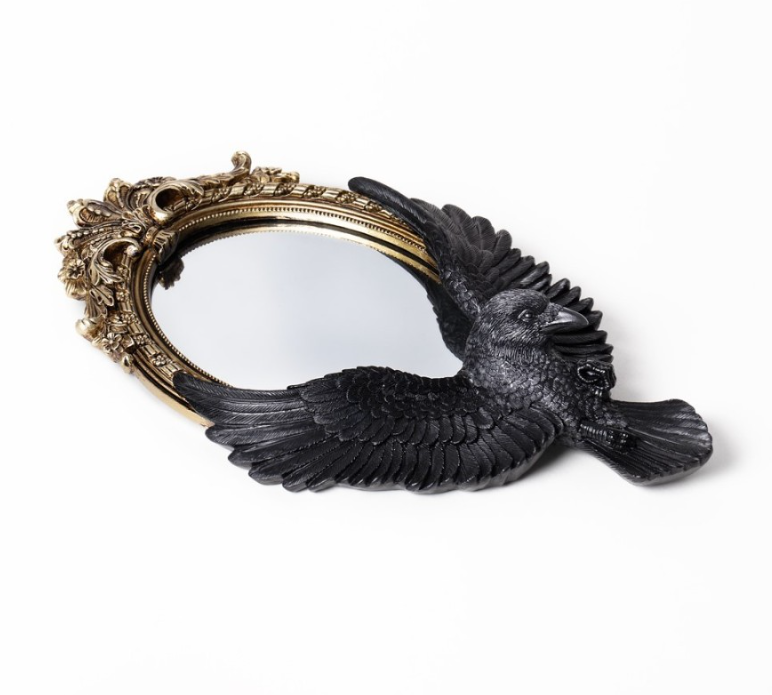Crafted with meticulous attention to detail, this stunning mirror features a realistically designed black raven in flight, exquisitely nestled within an opulent gold baroque frame.
The most beautiful addition to your boudoir! Whether you're applying your makeup, arranging your hair, or simply admiring your reflection, this mirror elevates each moment into an experience of beauty.
Look beyond the surface to perceive that which lies beneath. The dark sentinel guides your mind to wander through the dark plac