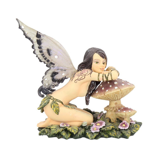 Step into a world of enchantment with this small Toadstool Fairy Figure, Serena. This beautiful Fairy figurine is truly exquisite, crafted from the finest resin and meticulously hand-painted to perfection.
