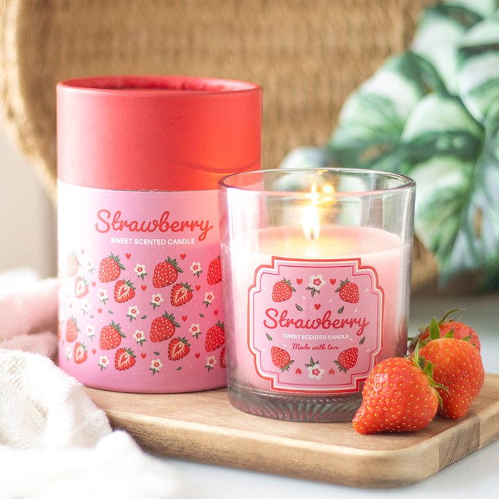 Infuse your sanctuary with the enchanting aroma of ripe strawberries from this candle. Housed in a glass vessel adorned with delicate floral and strawberry motifs, it features a wooden lid and comes nestled in a matching cylindrical box—ideal for a magical gift. With an approximate burn time of 25 hours, let its gentle glow and sweet scent weave a spell of comfort. Always tend your flame with care and never leave it unattended.