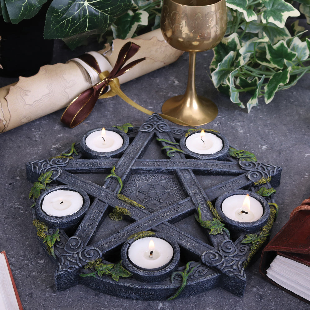 Wreathed in ivy and lichen, this tealight holder is perfect for illuminating your home in more ways than one. Cast in the highest quality resin, Celtic patterning and alchemist symbols reinforce the magic, while within the centre of the pentagram is another, smaller pentagram.