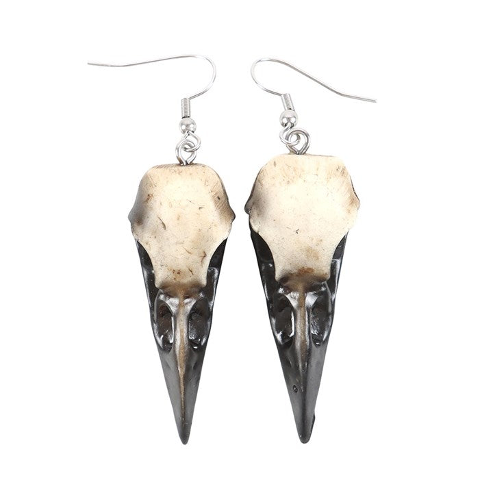 Complete your look with these statement resin crow skull dangle earrings. Light yet durable, they add an edgy and gothic touch to your style.