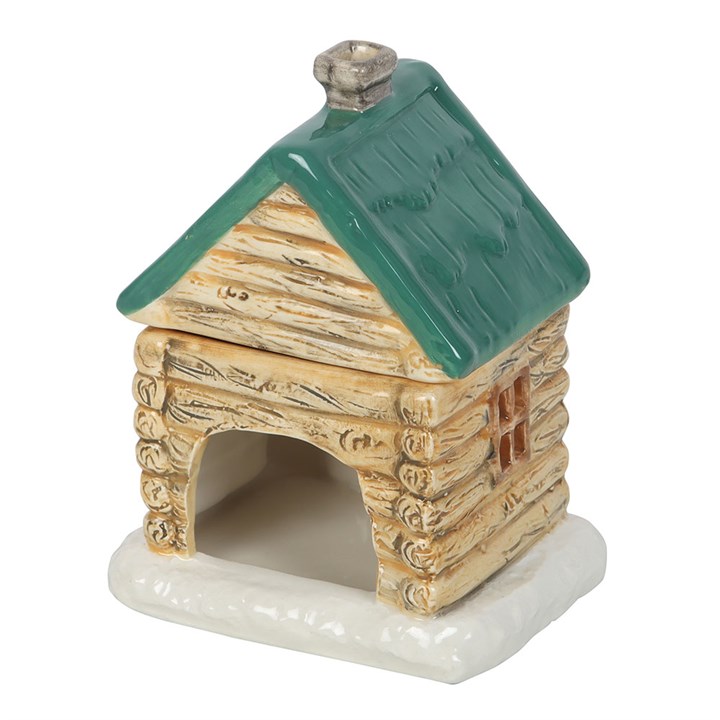 Transport your sacred space to a snow-dusted alpine retreat with this enchanting ceramic oil burner, lovingly shaped like a rustic ski chalet. As the veil of winter wraps around us, invite the comforting aroma of your favourite fragrance oils to dance gently through your home.
Crafted with mindful intention, this oil burner is more than décor—it is a tool for energetic alignment. Add a few drops of cleansing oil blended with water to the bowl, light a tealight within, and allow the flame to awaken the elem