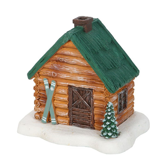 This enchanting incense cone holder, crafted as a quaint ski chalet, brings a whisper of alpine magic to your sacred space. As the incense burns, delicate smoke curls from the chimney, weaving a spell of winter’s quiet mystery. Perfect for those who cherish rustic charm or seek a mystical gift, it invites warmth and wonder into your ritual. Remember to honor the flame with care—always use a proper holder and never leave burning incense unattended.
