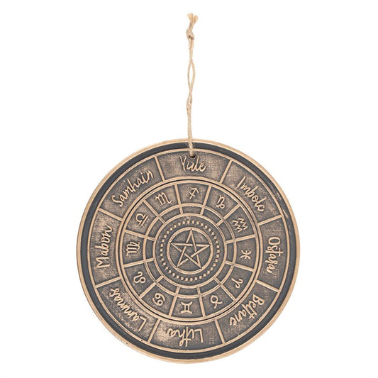 This hanging terracotta plaque features a bronze-effect finish and an engraved Wheel of the Year design, symbolising the cyclical rhythm of nature’s seasons. Ideal for decorating spiritual spaces or marking sabbats throughout the year.