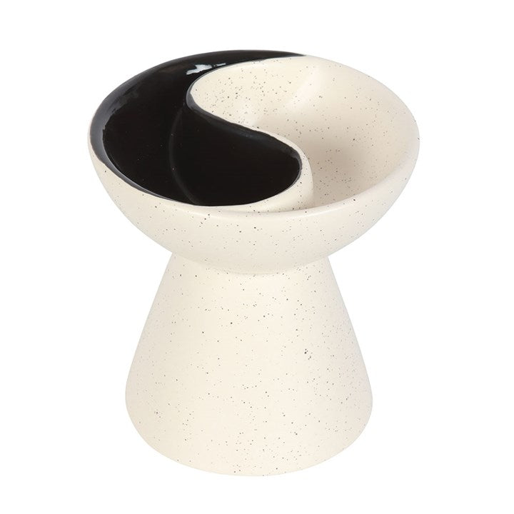 Ceramic bowl with black interior on a white background