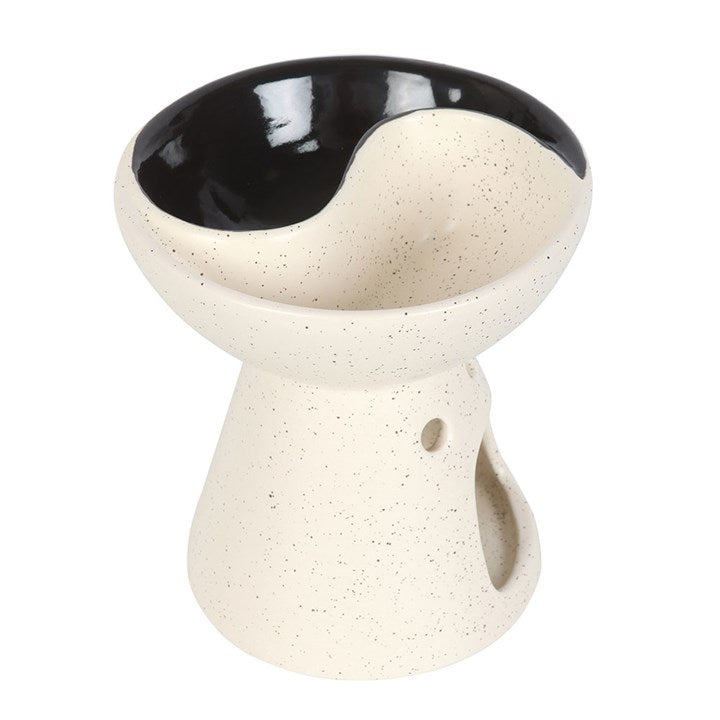 Ceramic bowl with black interior on a white background