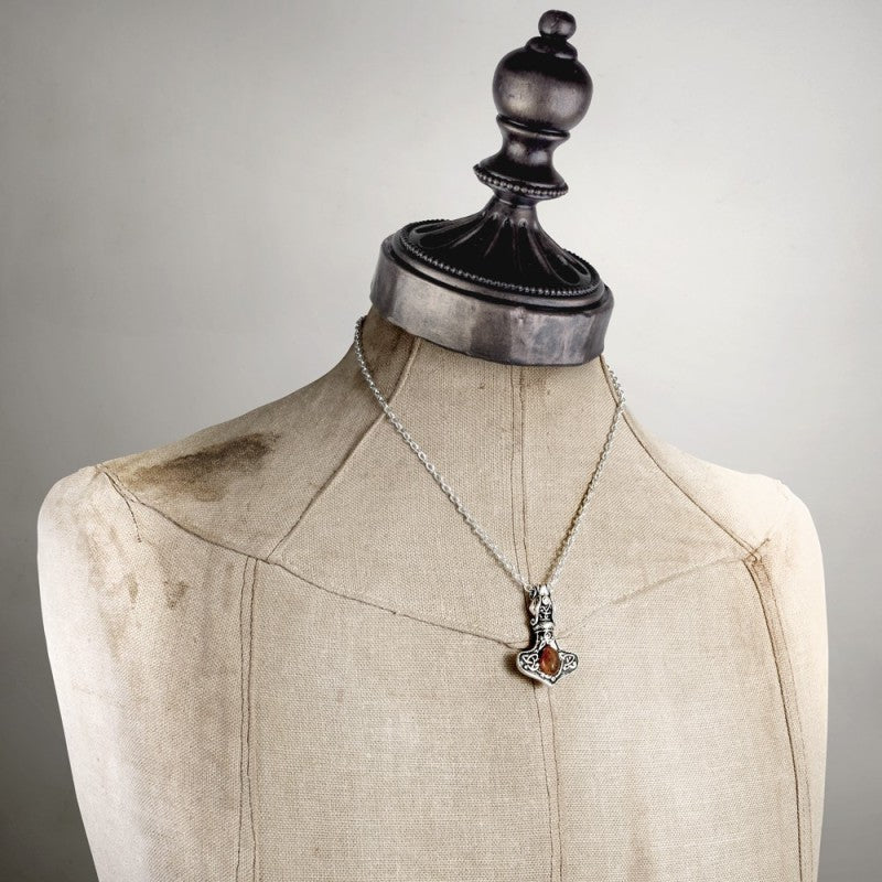 Viking-inspired Alchemy Gothic Thor’s Hammer pendant with real amber. A powerful amulet of protection with Celtic knots, runes & dragon detailing.