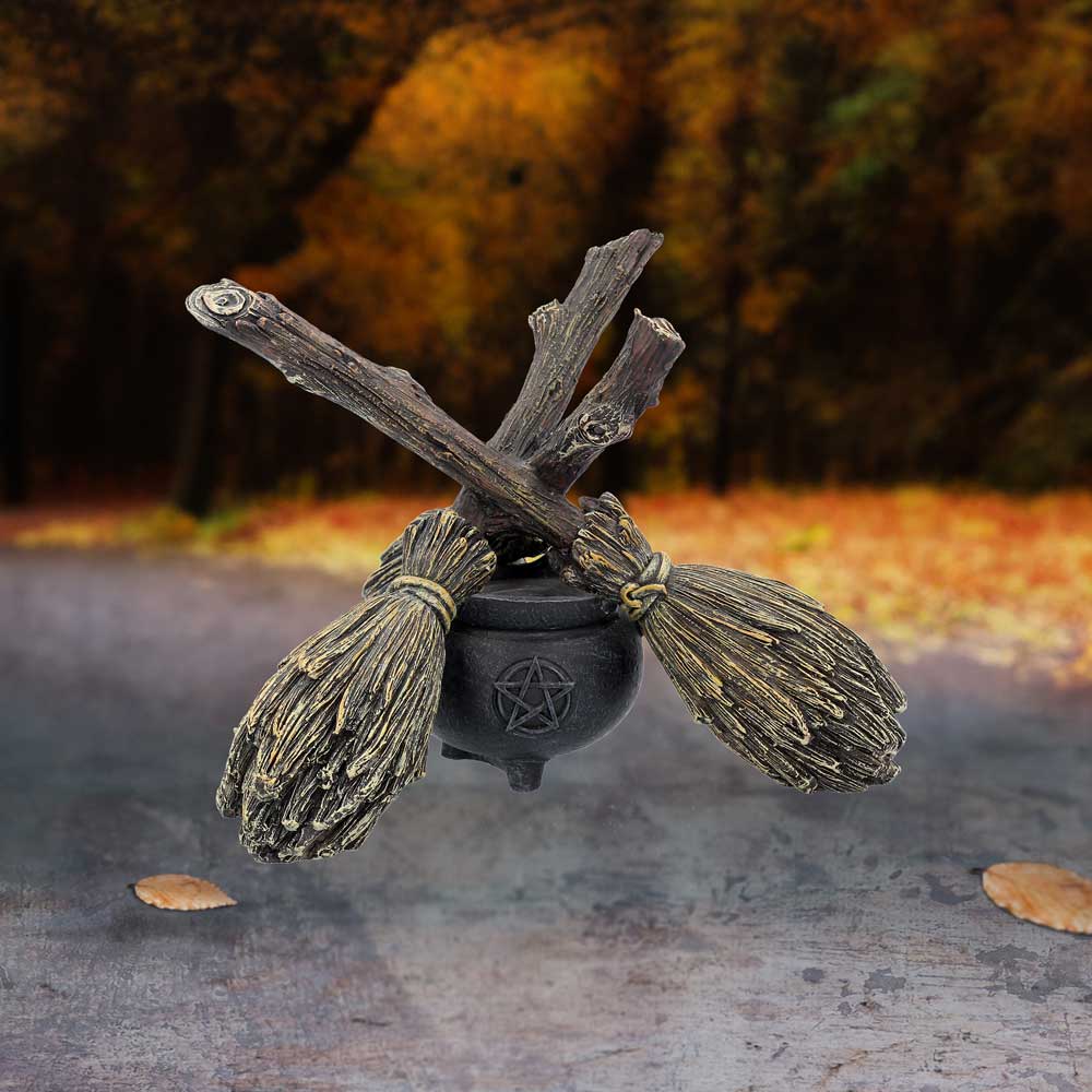 Summon sacred energy and unveil the unseen.
Crafted for the wild-hearted witch, this enchanting crystal ball holder unites three intricately bound broomsticks in a protective triangular embrace. Resting atop a spellbound pentagram cauldron, they form a mystic throne for your crystal ball—small or large—awaiting scrying, ritual, or moonlit reflection.
Forged from high-quality resin and hand-painted with ethereal detail, this unique altar piece channels the spirit of old-world magic. Whether you’re casting i