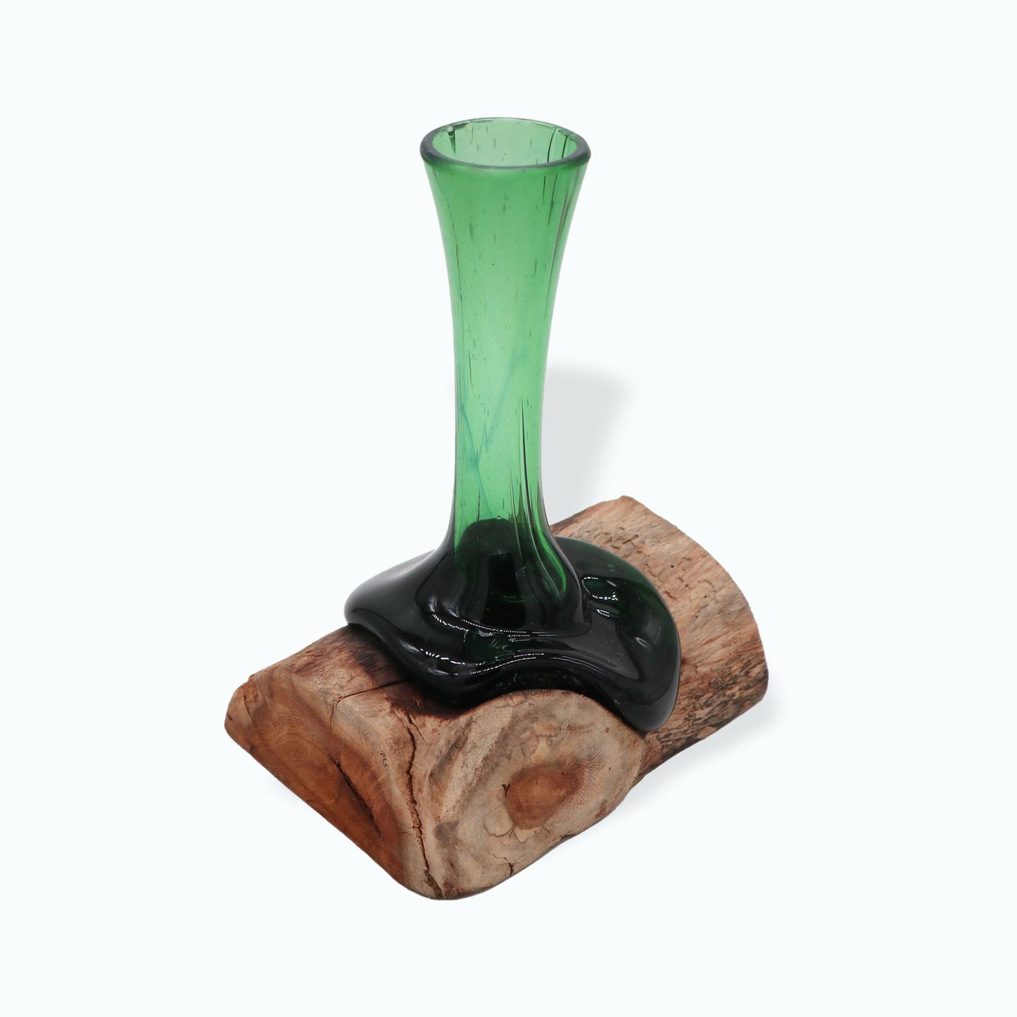 Step into the realm where magic meets craftsmanship with our Molten Recycled Beer Bottles Glass on Wood. Each piece is a talisman of transformation: once ordinary beer bottles, now reborn through fire and skill into a vessel of light and energy. The molten green glass, cradled by a sturdy wooden base, mirrors the ancient alchemy of nature—turning the old into something uniquely beautiful.
In folklore, glass has long been a protector against negative spirits and a conduit for clarity, while wood roots your
