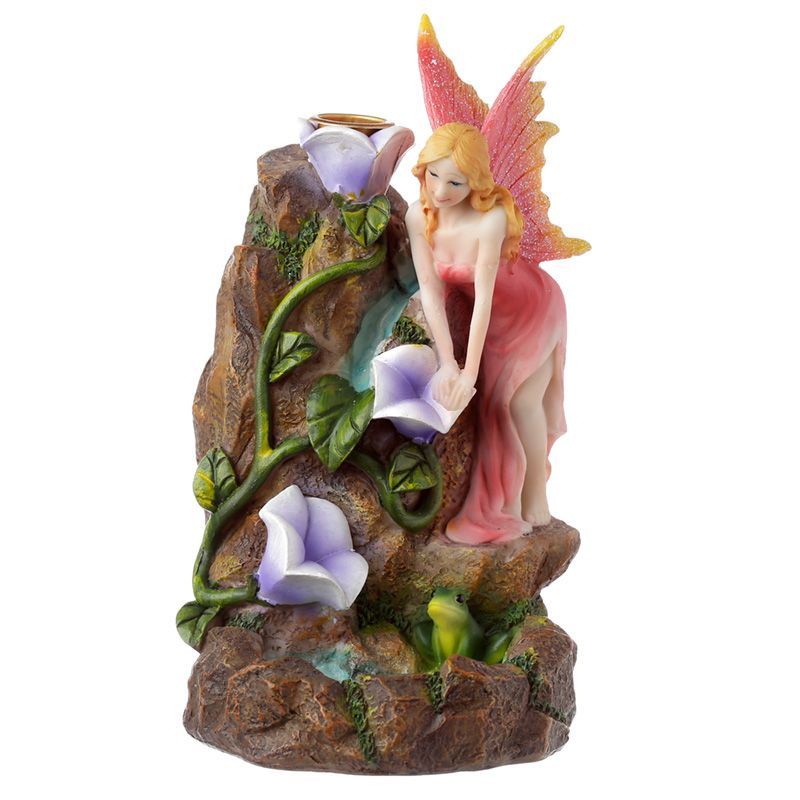 Step into an enchanted realm with the Fairy Flower Garden Waterfall Backflow Incense Burner. Designed with delicate floral detail and whimsical fairy energy, this burner transforms your space into a sanctuary of magic and serenity.
In folklore, fairies are guardians of nature, protectors of flowers, and symbols of transformation. When paired with backflow incense cones, smoke flows gently like a cascading waterfall through the fairy’s flower garden, creating a mesmerizing, mystical effect.
Perfect for med