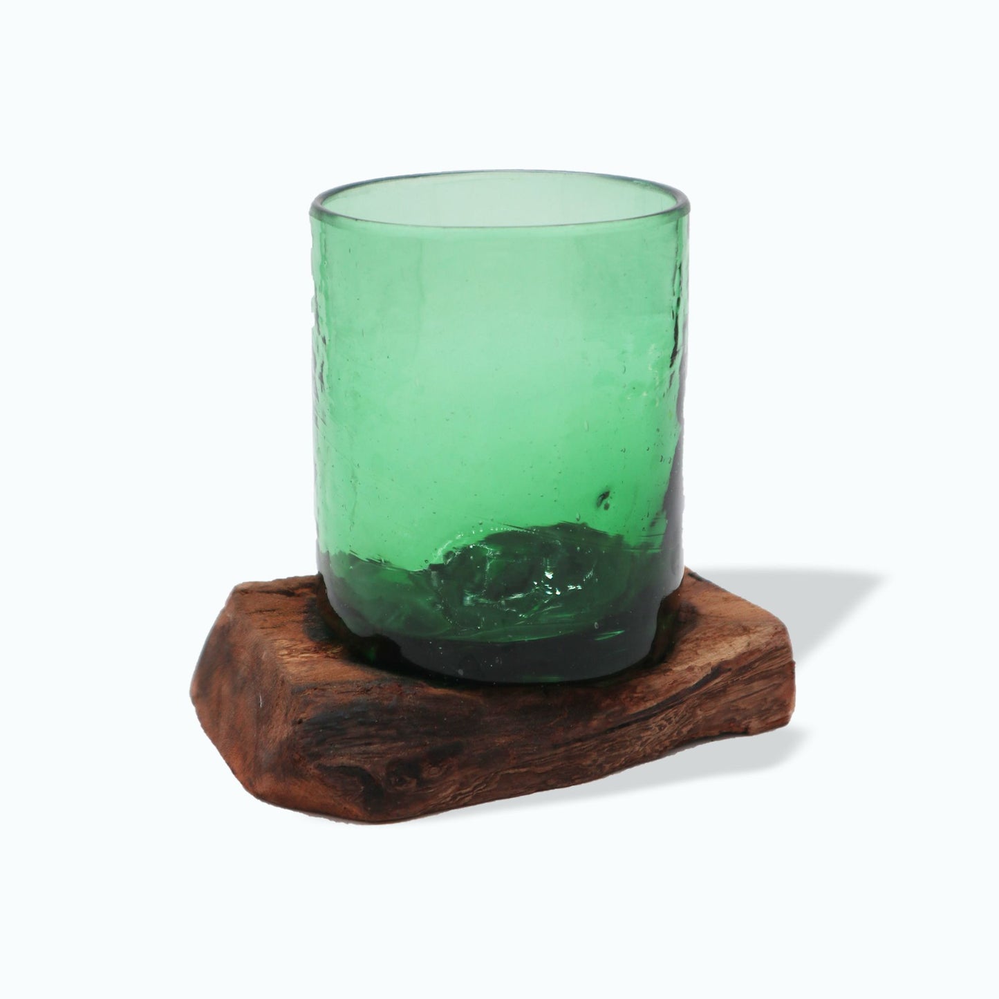 Discover the soulful charm of our Molten Recycled Beer Bottles Glass on Wood, a true celebration of eco-conscious artistry. Each piece is lovingly handmade in Indonesia, crafted from melted recycled beer bottles and set upon a rustic wooden base, blending green glass beauty with earthy warmth. The organic flow of molten glass ensures that no two pieces are alike, making each a one-of-a-kind treasure for your home.
In bohemian folklore, repurposed glass symbolizes transformation and renewal—the old reborn i